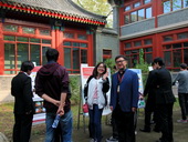 Prof. Zhou and Jielei Zhang at poster session